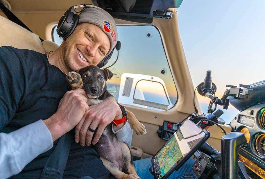 Top Dog Michael Schneider and Furry Co-paw-lot